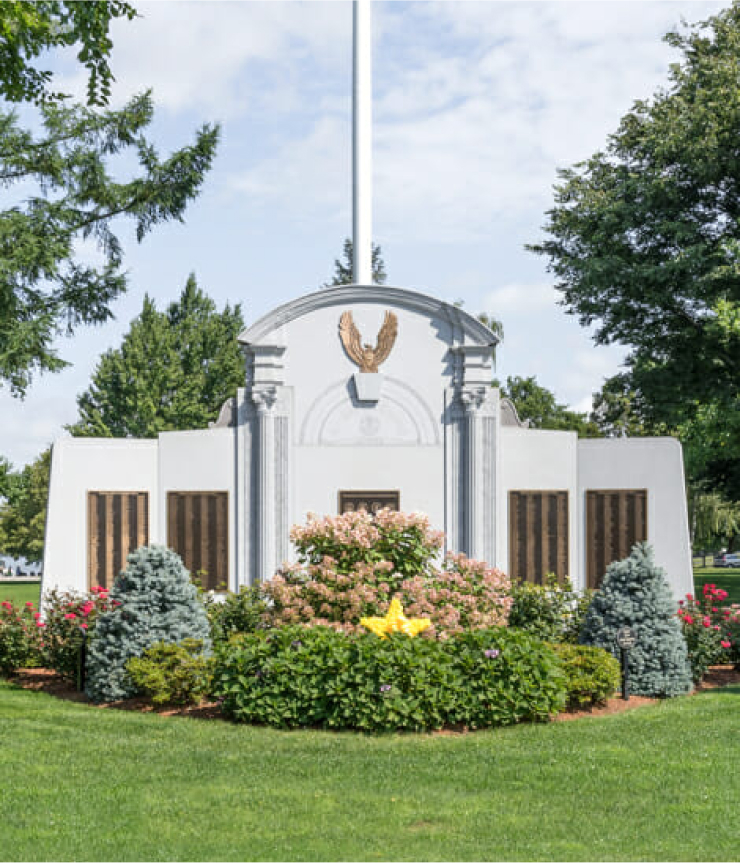 Civic memorial with shrubbery landscaping