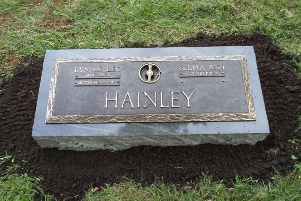 Custom bronze grave marker.