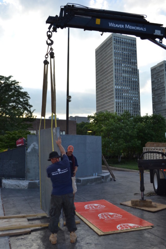 Memorial being lowered into place.