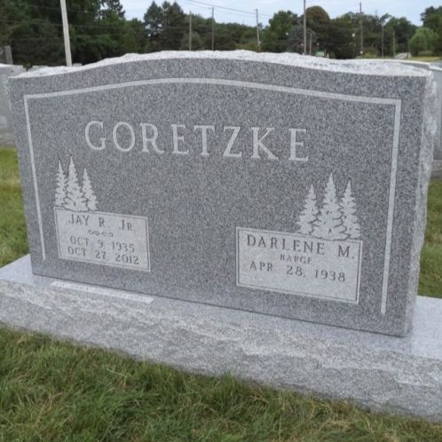 Gray granite monument.