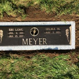Custom bronze grave marker.
