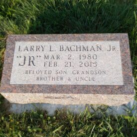 Custom engraved headstone.