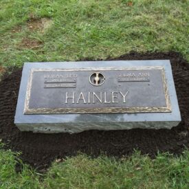 Custom bronze grave marker.