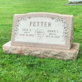 Custom engraved headstone.