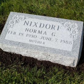 Custom engraved headstone.