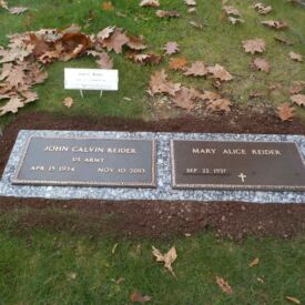 Custom bronze grave marker.