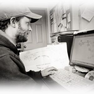 Step 2: Our designers will then take your ideas to create a truly custom memorial design. The possibilities are limitless. Craftsman digitally sketching a design.