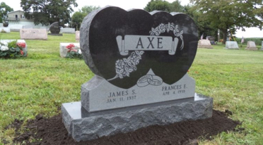 Ornate granite headstone.